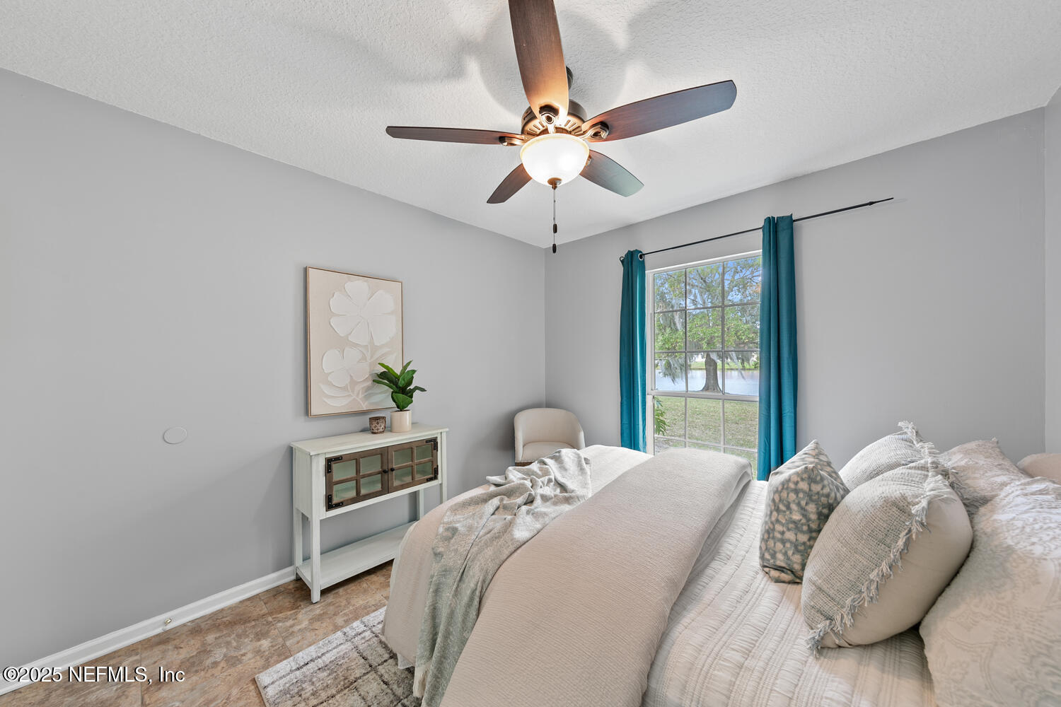 113 Nottingham Drive St. Johns, FL 32259 - Photo 23 of 35 a bedroom with a bed and a window