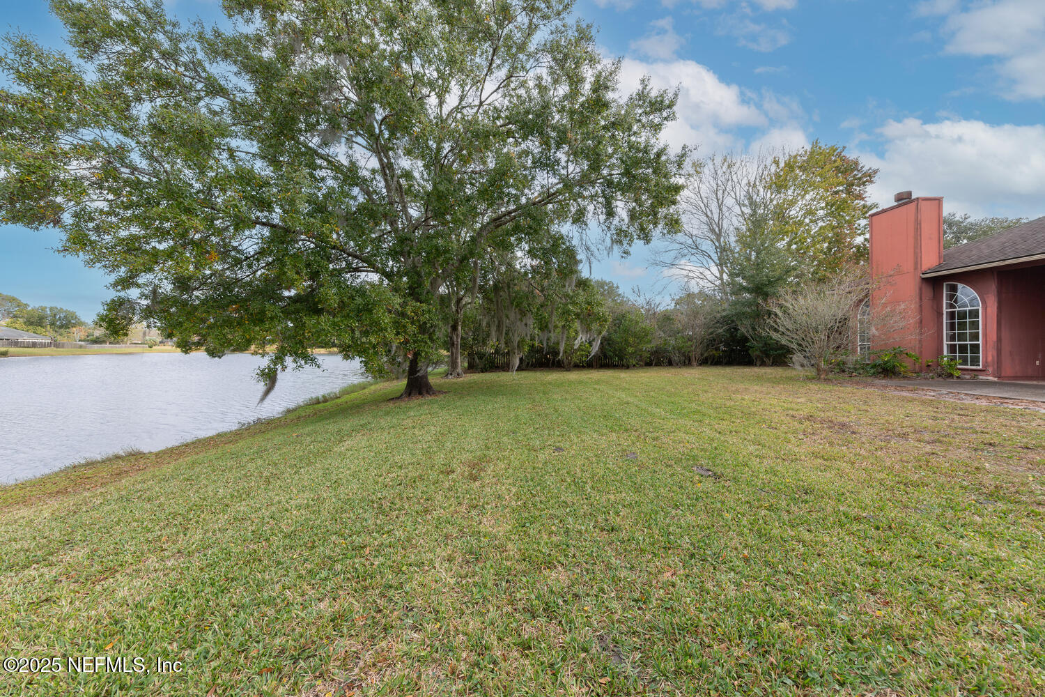 113 Nottingham Drive St. Johns, FL 32259 - Photo 29 of 35 a view of a yard with a tree