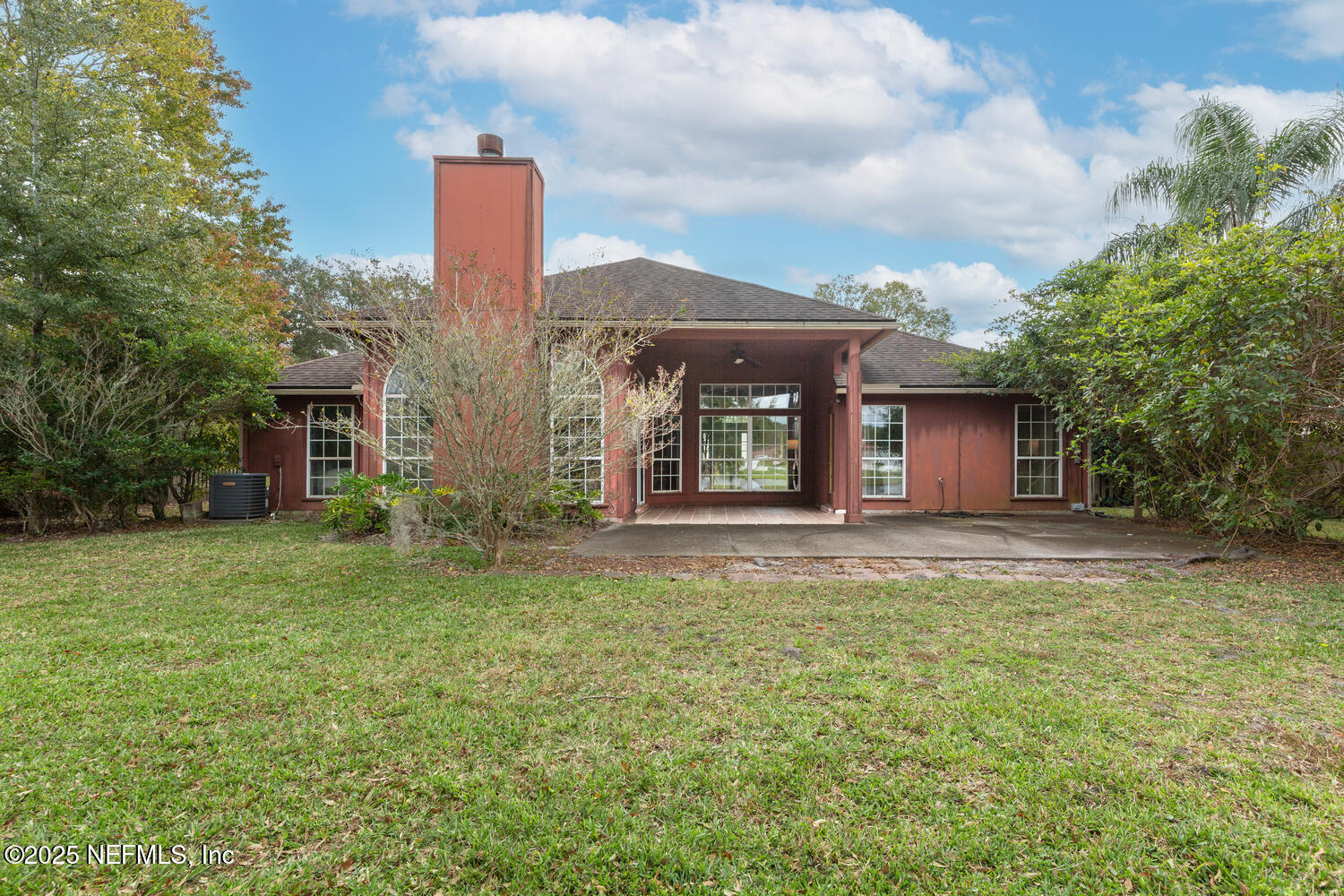 113 Nottingham Drive St. Johns, FL 32259 - Photo 30 of 35 a front view of a house with garden