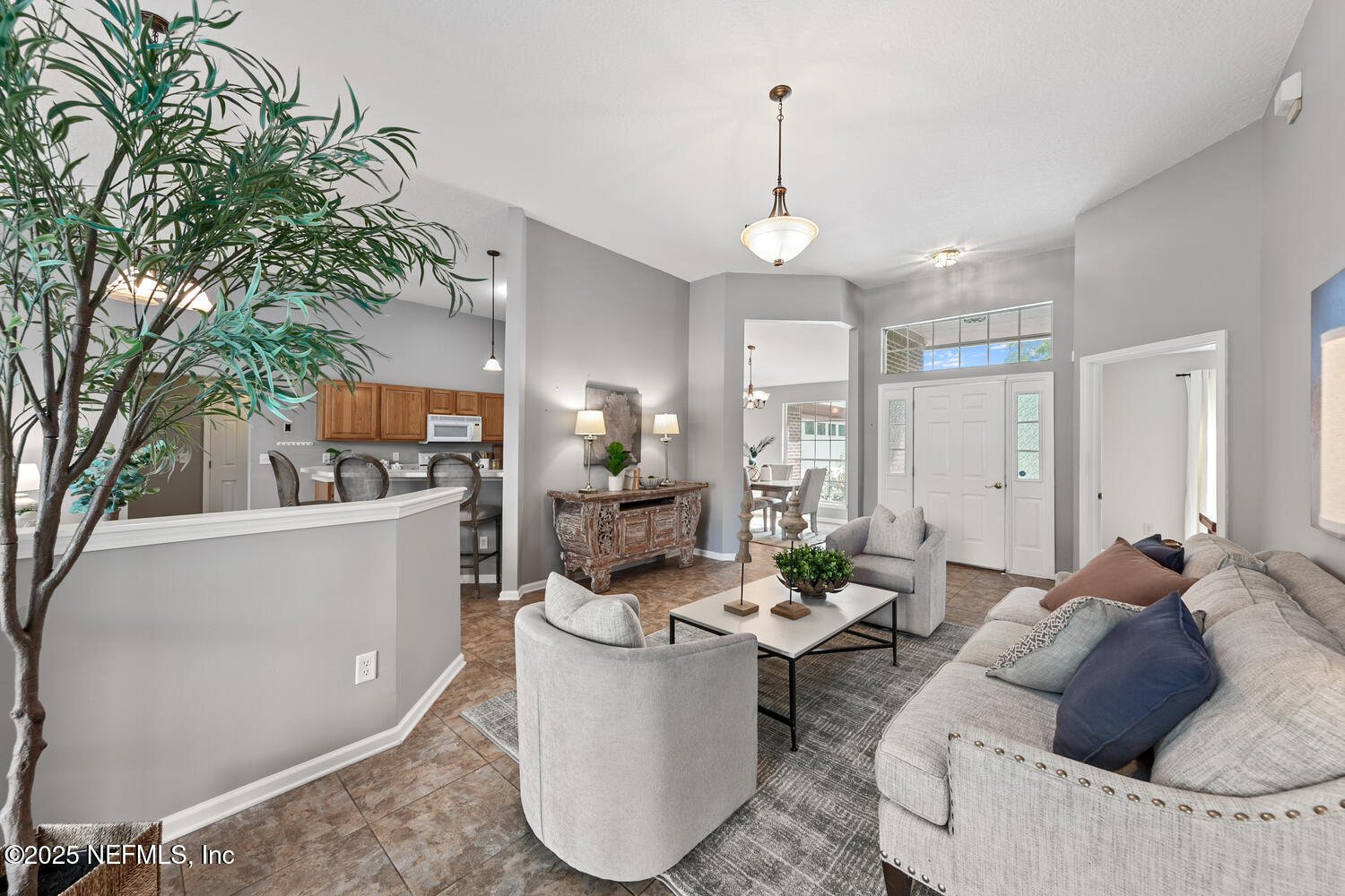 113 Nottingham Drive St. Johns, FL 32259 - Photo 10 of 35 a living room with furniture and a potted plant