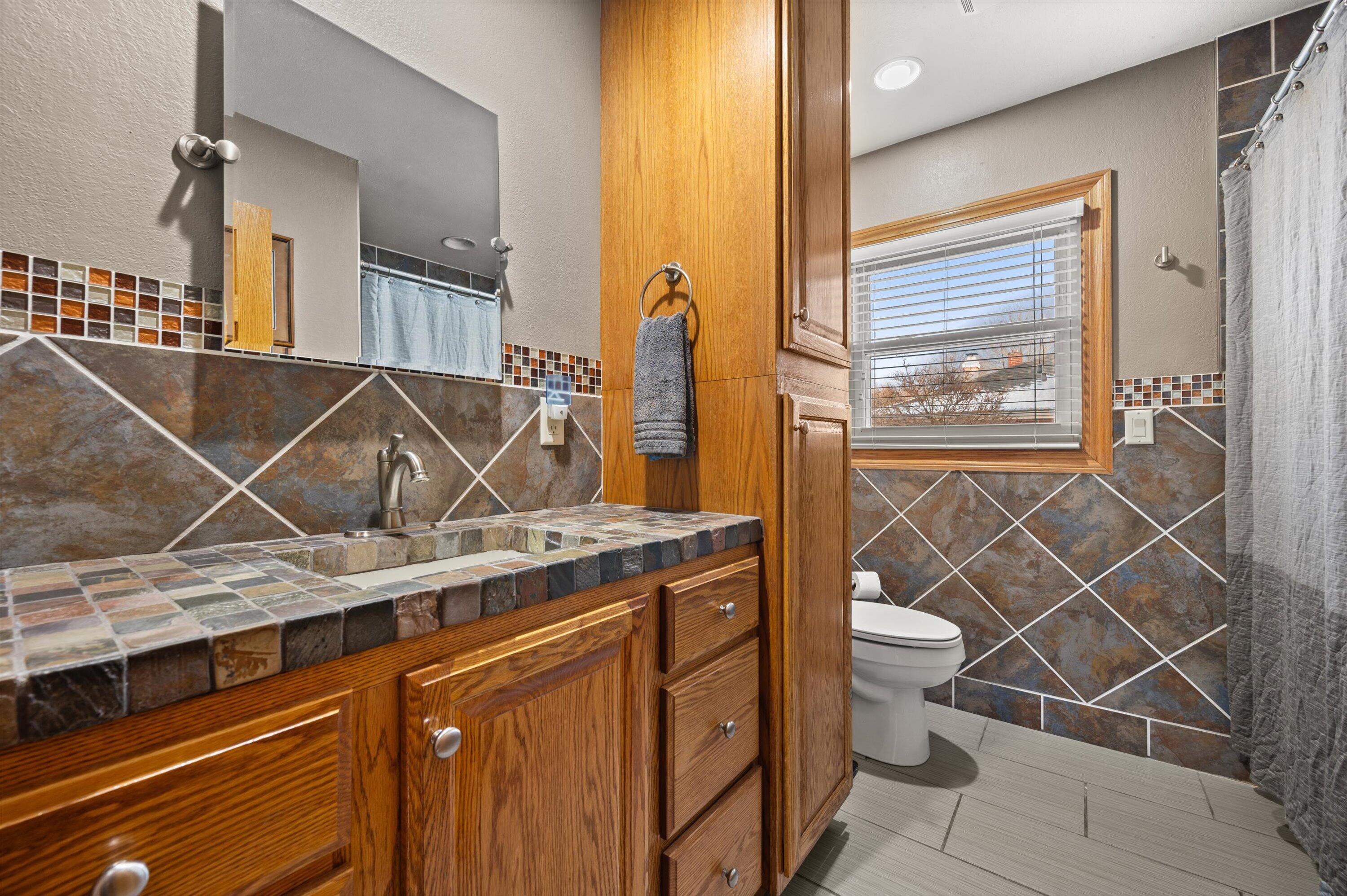 817 Scott Street Beaver Dam, WI 53916 - Photo 12 of 24 Gorgeous Tile and Amish-Built Cabinets!