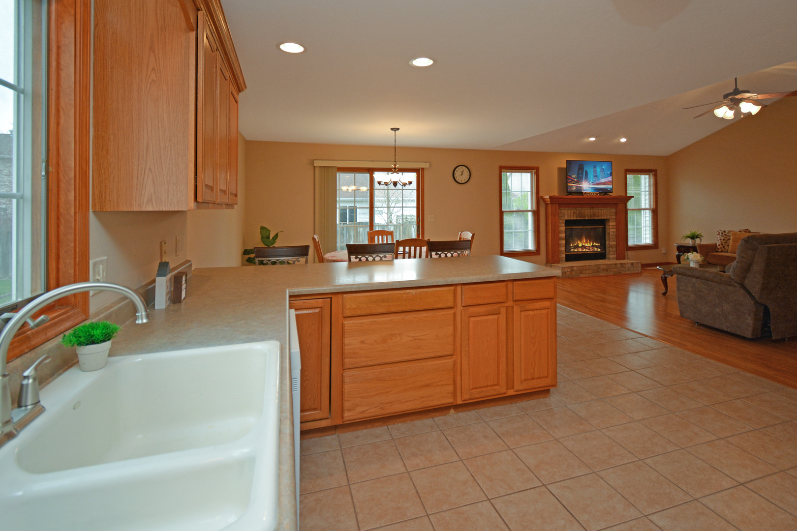 2884 Bear Claw Street Normal, IL 61761 - Photo 18 of 62 a kitchen with sink cabinets and window