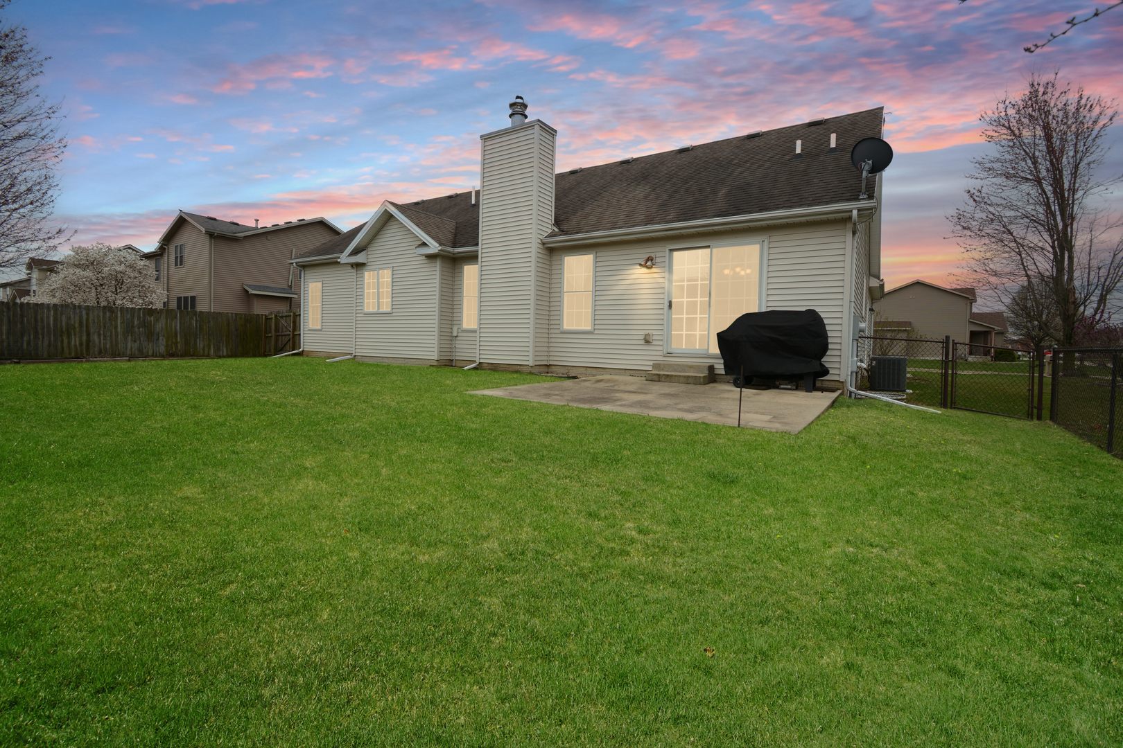 2884 Bear Claw Street Normal, IL 61761 - Photo 2 of 62 a house view with a garden space