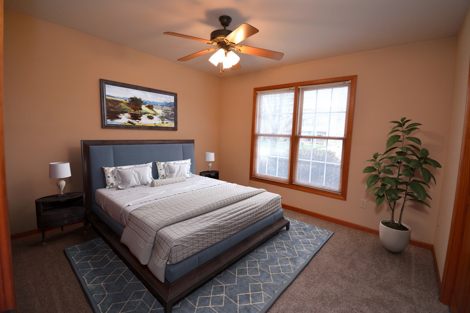 2884 Bear Claw Street Normal, IL 61761 - Photo 43 of 62 a bedroom with bed and a potted plant