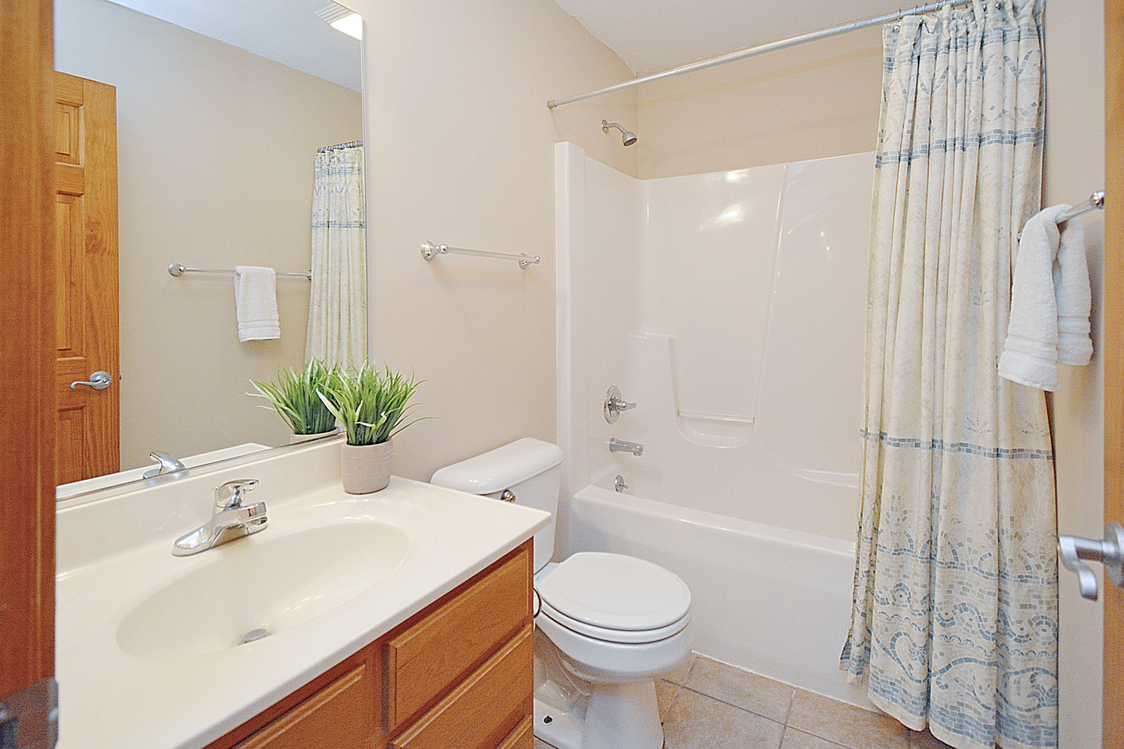 2884 Bear Claw Street Normal, IL 61761 - Photo 44 of 62 a bathroom with a sink toilet and shower
