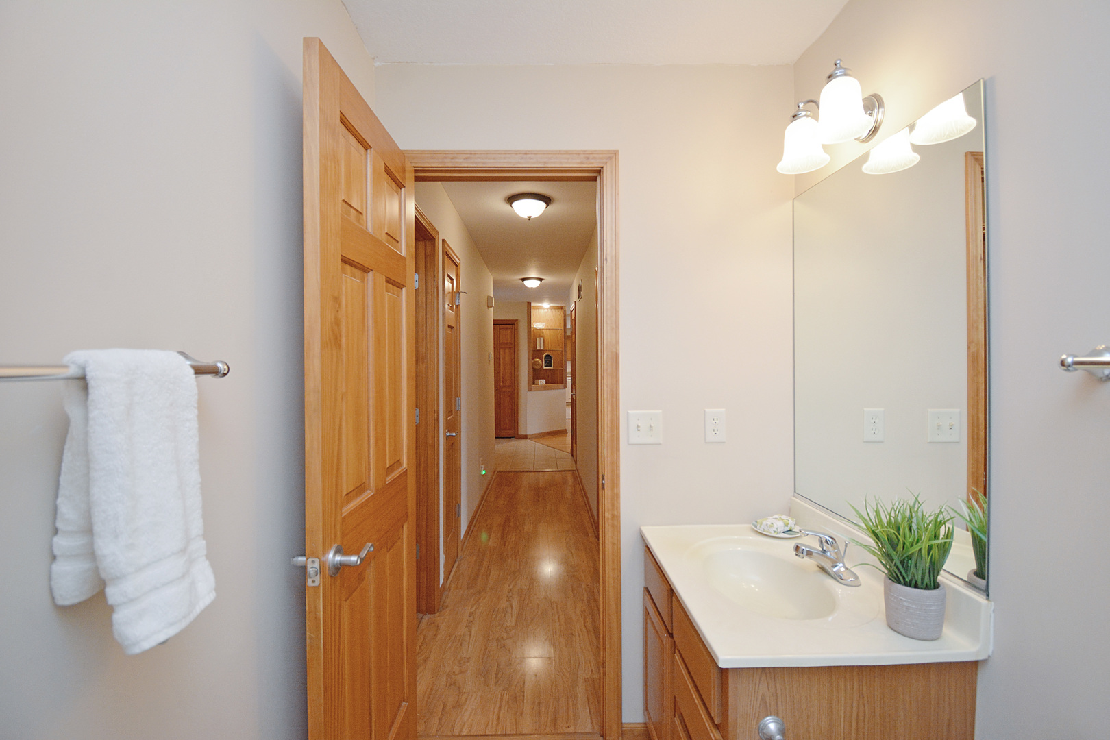 2884 Bear Claw Street Normal, IL 61761 - Photo 45 of 62 a bathroom with a tub shower and a mirror