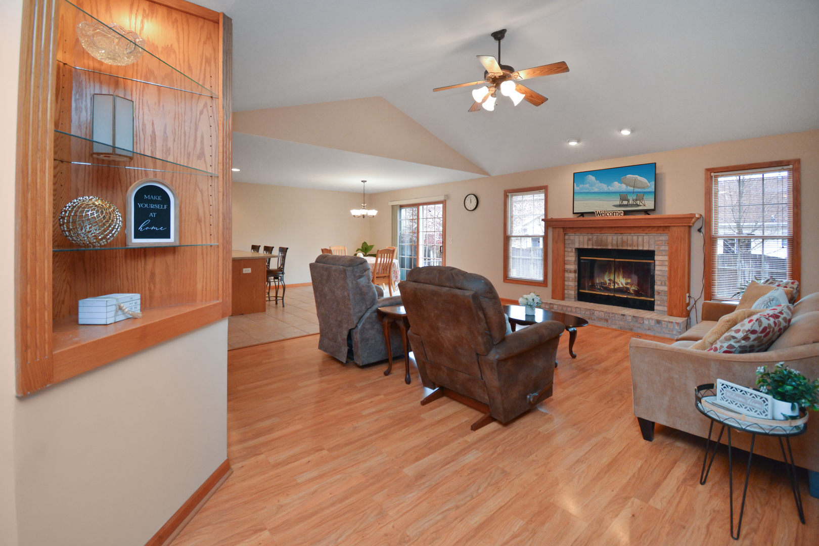 2884 Bear Claw Street Normal, IL 61761 - Photo 5 of 62 a living room with furniture and a fireplace