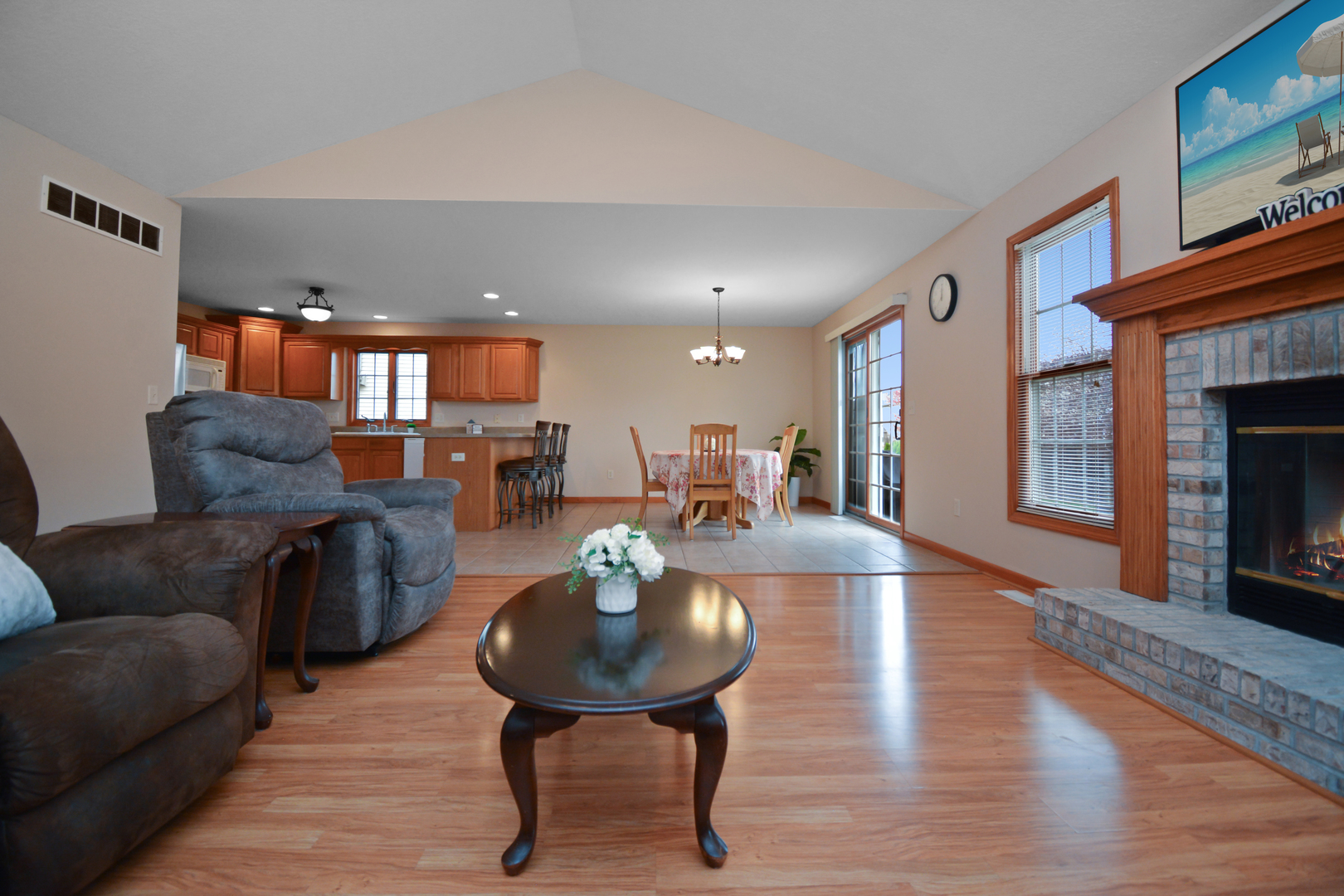 2884 Bear Claw Street Normal, IL 61761 - Photo 54 of 62 a living room with furniture and a fireplace