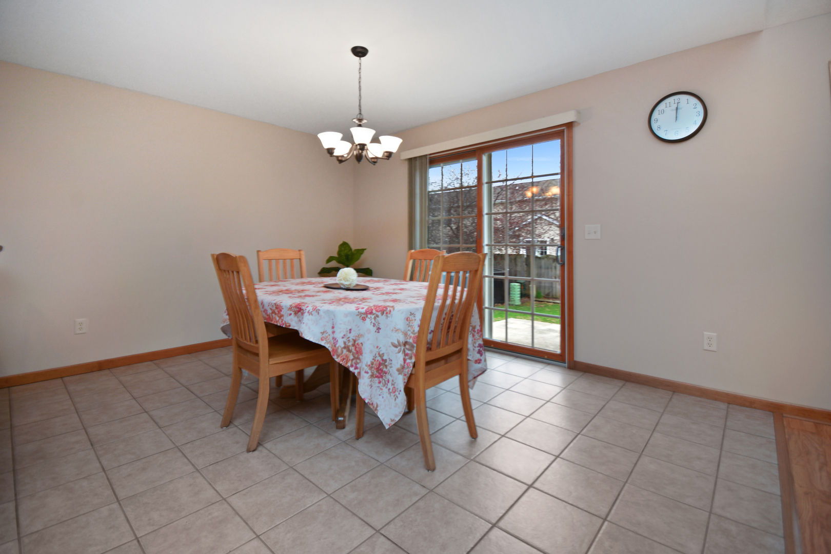 2884 Bear Claw Street Normal, IL 61761 - Photo 59 of 62 a view of a dining room with furniture window and chandelier