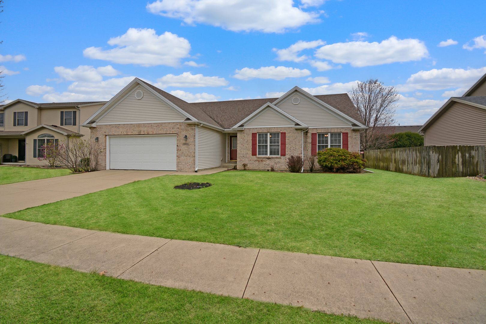 2884 Bear Claw Street Normal, IL 61761 - Photo 61 of 62 a front view of house with yard and green space