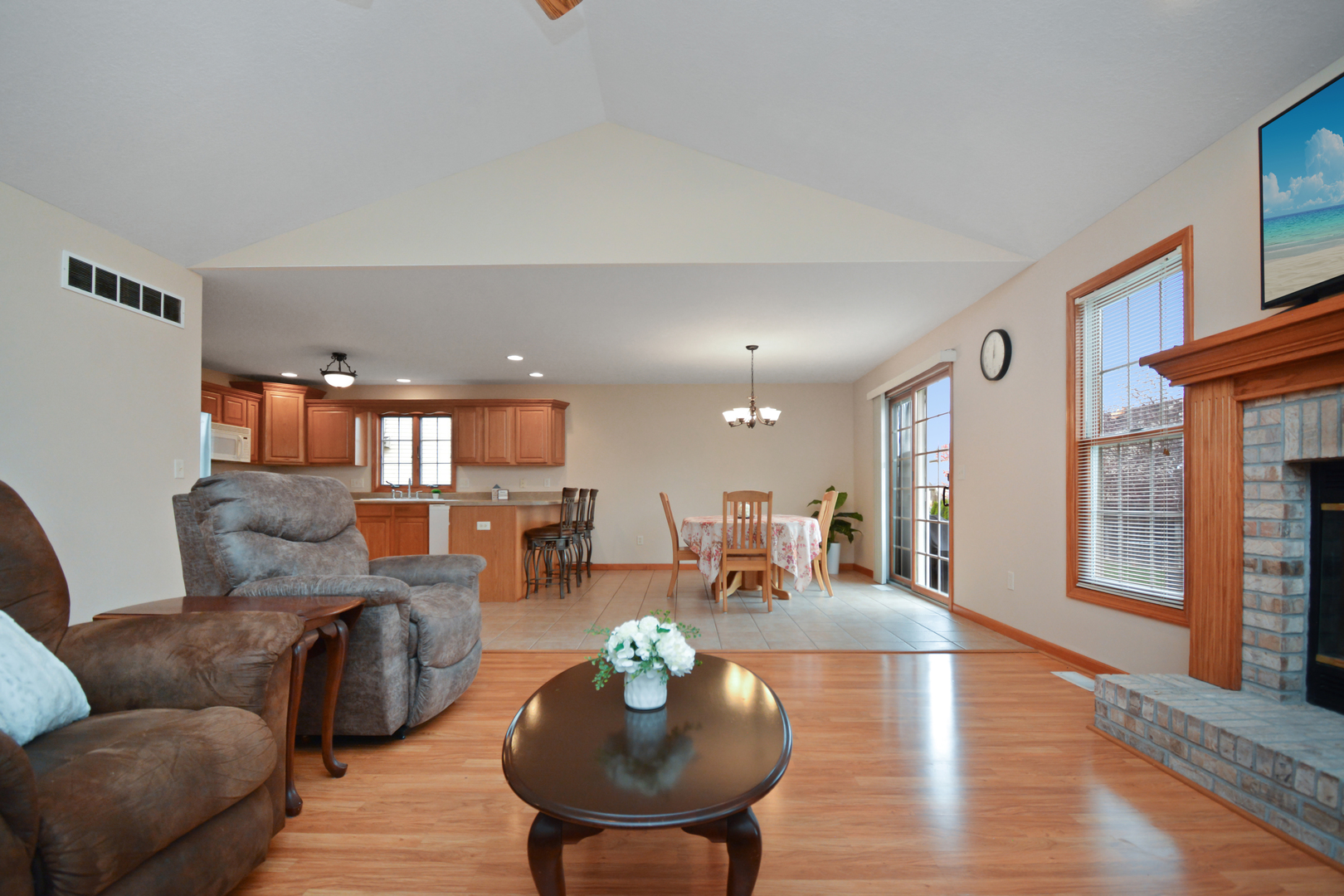 2884 Bear Claw Street Normal, IL 61761 - Photo 9 of 62 a living room with furniture and a wooden floor
