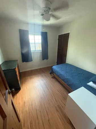 wooden floor in a hall with an entryway