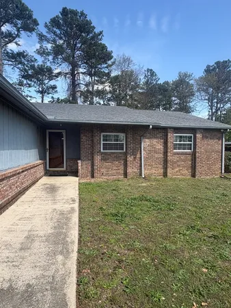 a house view with a garden space