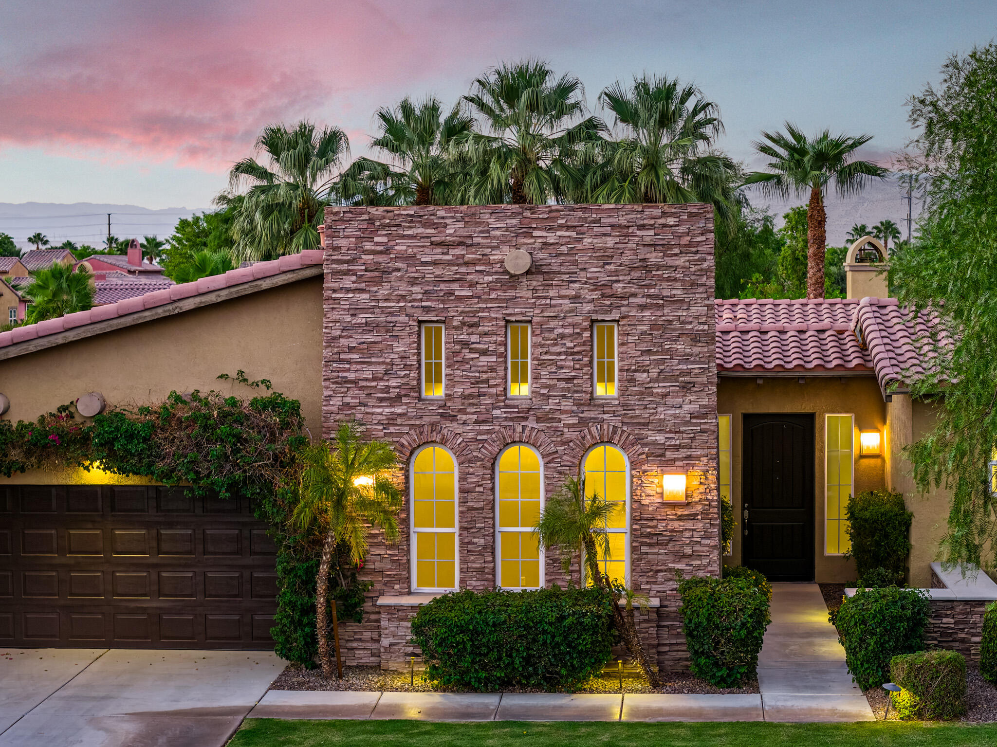 14 Via Santo Tomas Drive Rancho Mirage, CA 92270 - Photo 13 of 61 a front view of a house with garden