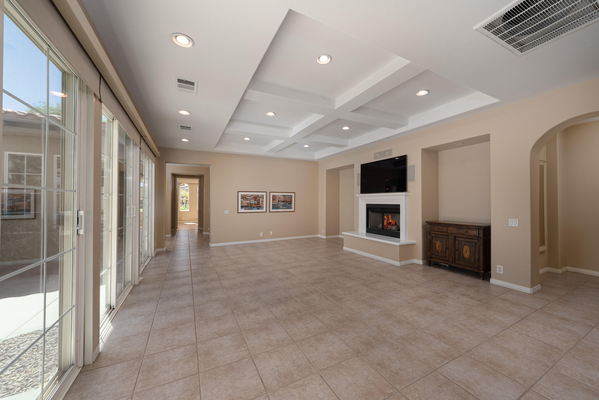 14 Via Santo Tomas Drive Rancho Mirage, CA 92270 - Photo 18 of 61 an empty room with windows and a television