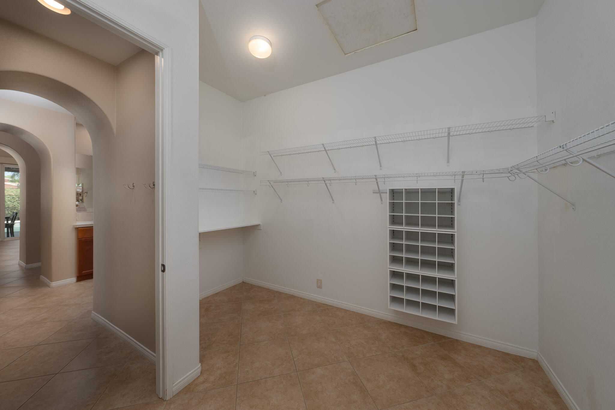14 Via Santo Tomas Drive Rancho Mirage, CA 92270 - Photo 33 of 61 an empty room with windows