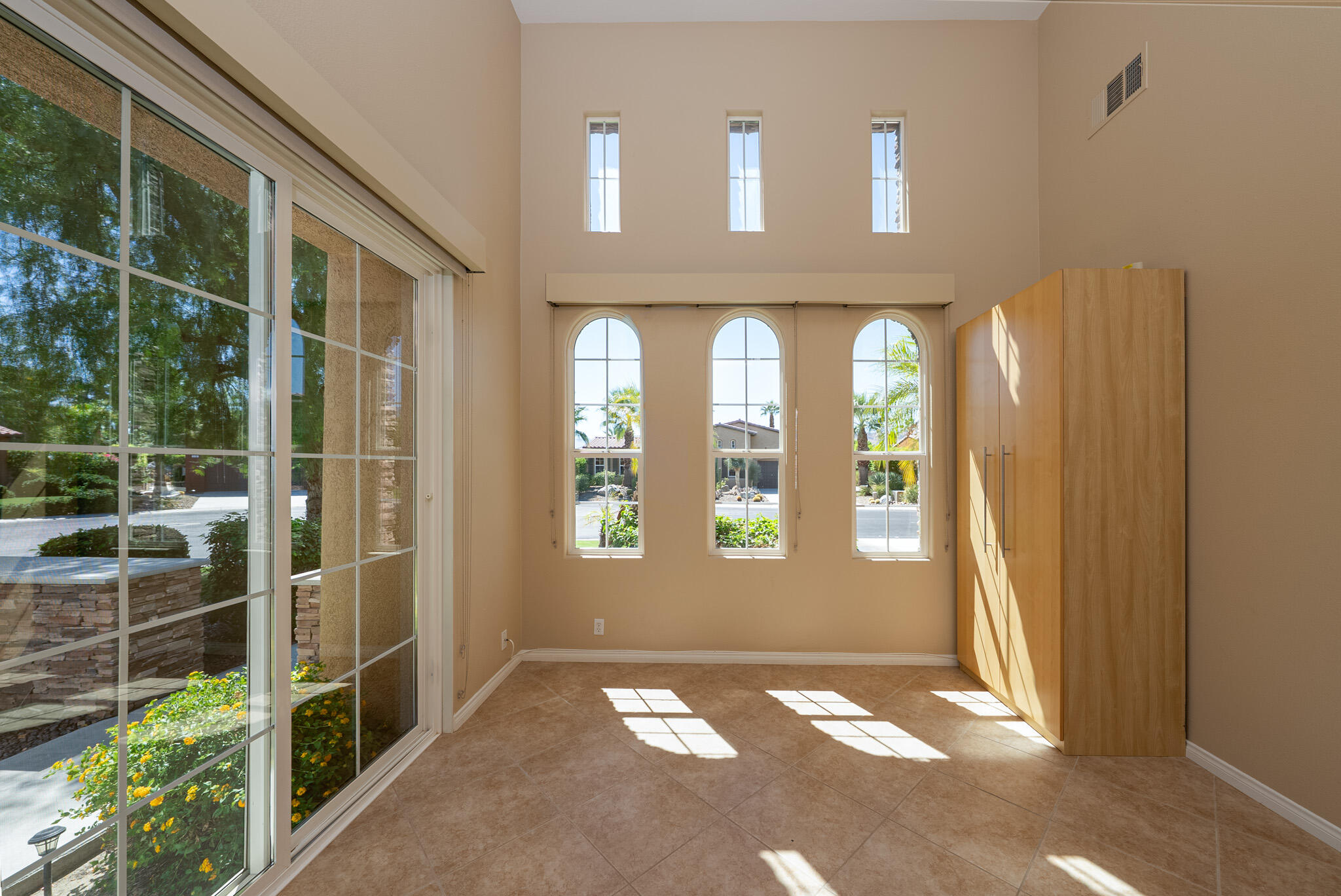 14 Via Santo Tomas Drive Rancho Mirage, CA 92270 - Photo 38 of 61 a view of an empty room with windows
