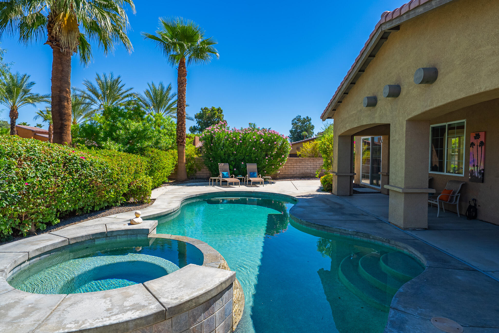 14 Via Santo Tomas Drive Rancho Mirage, CA 92270 - Photo 43 of 61 a view of a swimming pool with a patio