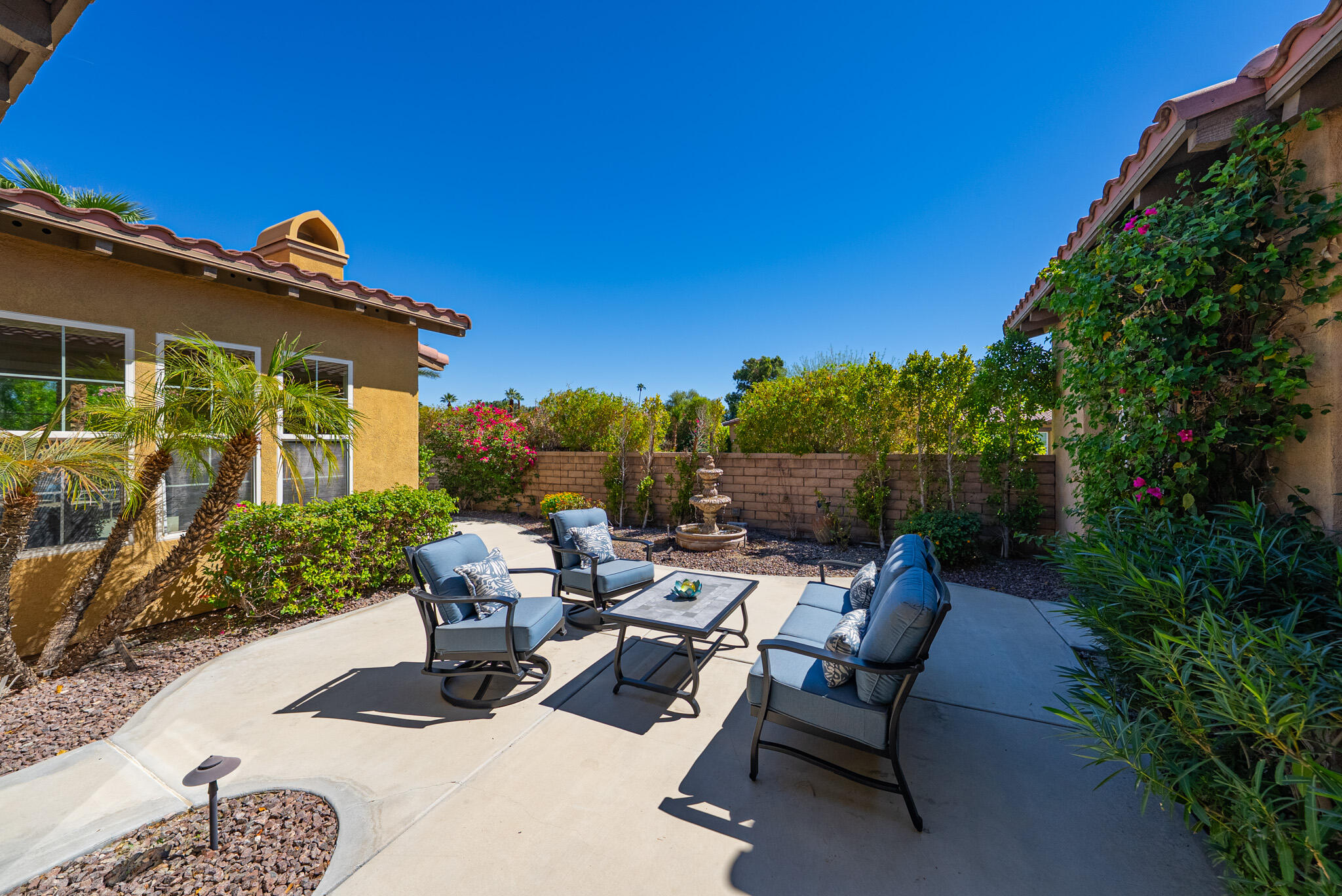 14 Via Santo Tomas Drive Rancho Mirage, CA 92270 - Photo 47 of 61 a roof deck with table and chairs and potted plants