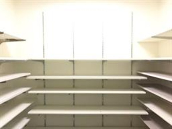 111 Everett Avenue, Unit 1A Chelsea, MA 02150 - Photo 17 of 20 a view of a room with shelves