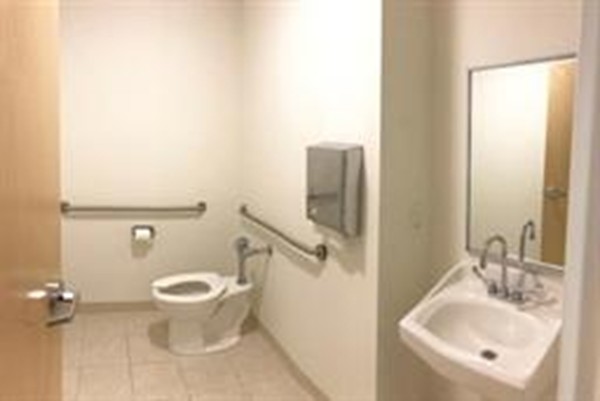 111 Everett Avenue, Unit 1A Chelsea, MA 02150 - Photo 8 of 20 a bathroom with a sink and a toilet