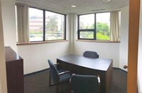 111 Everett Avenue, Unit 1A Chelsea, MA 02150 - Photo 9 of 20 a view of a workspace with a window