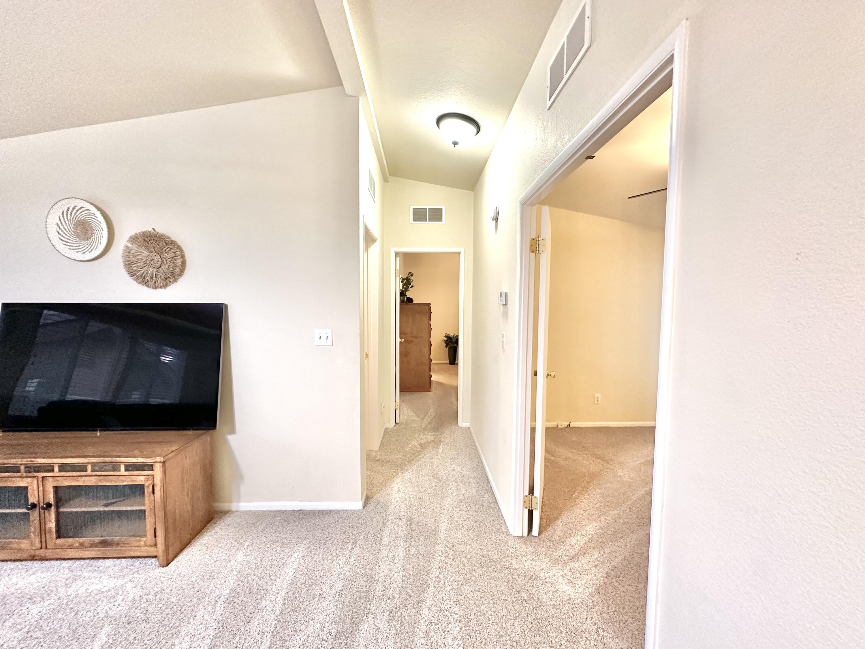4713 Maple Trail, Unit LOS ROBLES ESTATES Redding, CA 96003 - Photo 14 of 22 a view of living room with furniture and flat screen tv