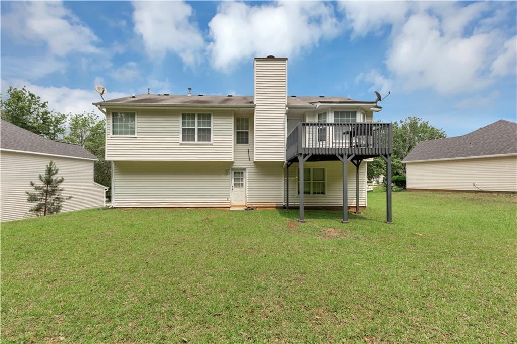 2880 Field Spring Drive Lithonia, GA 30058 - Photo 29 of 31 a view of a house with a backyard