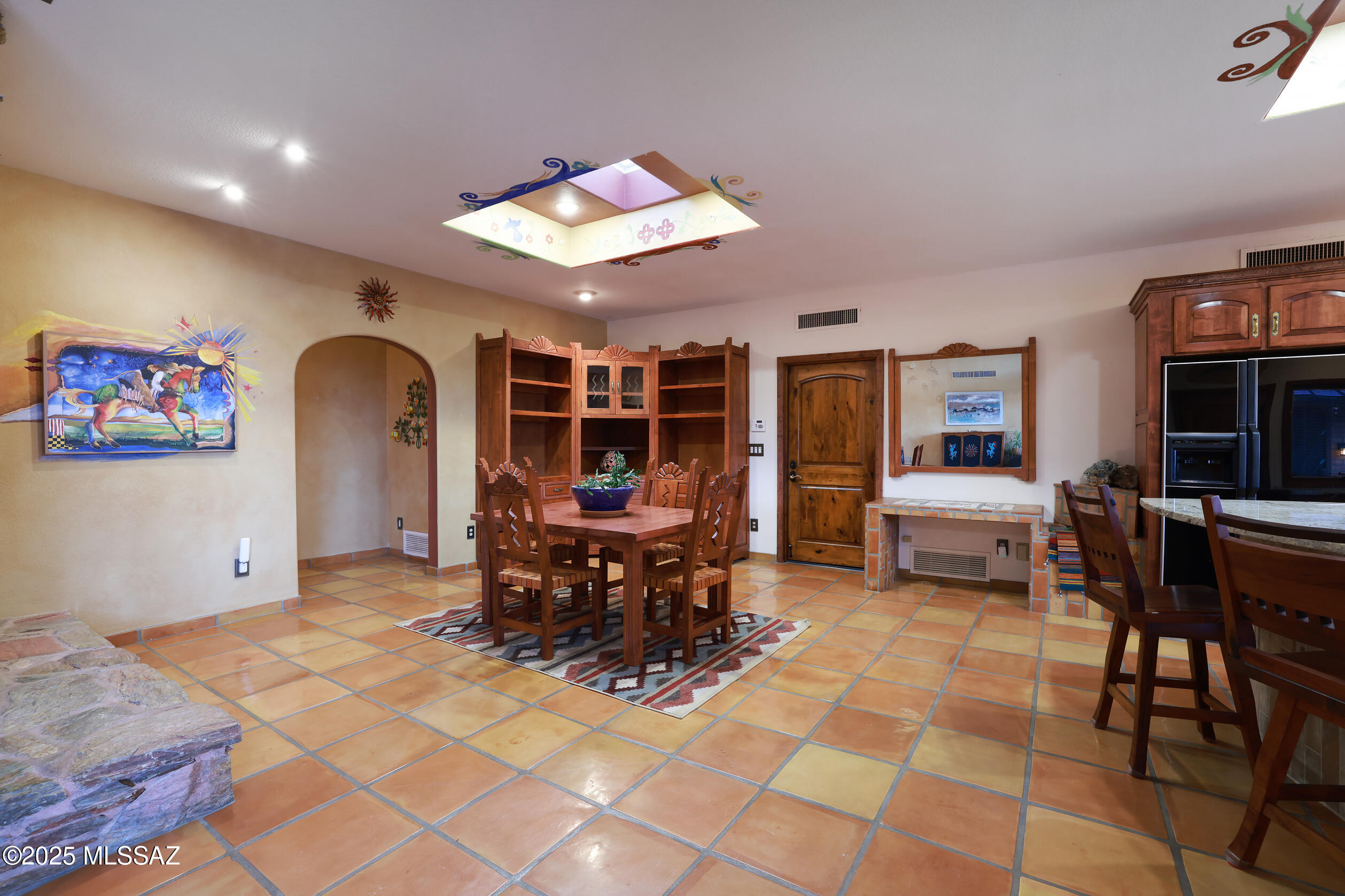 925 North Rancho Del Jefe Loop Tucson, AZ 85748 - Photo 17 of 52 a view of a dining room with furniture and chandelier