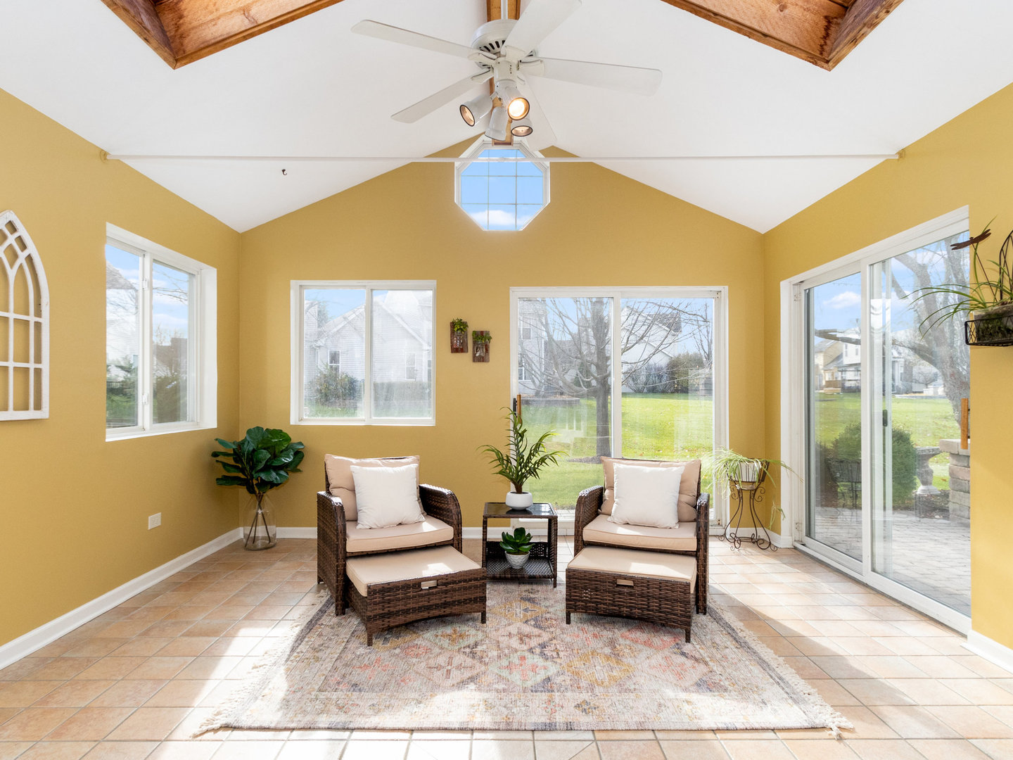 1195 Amaranth Drive Naperville, IL 60564 - Photo 12 of 48 a living room with furniture and a floor to ceiling window