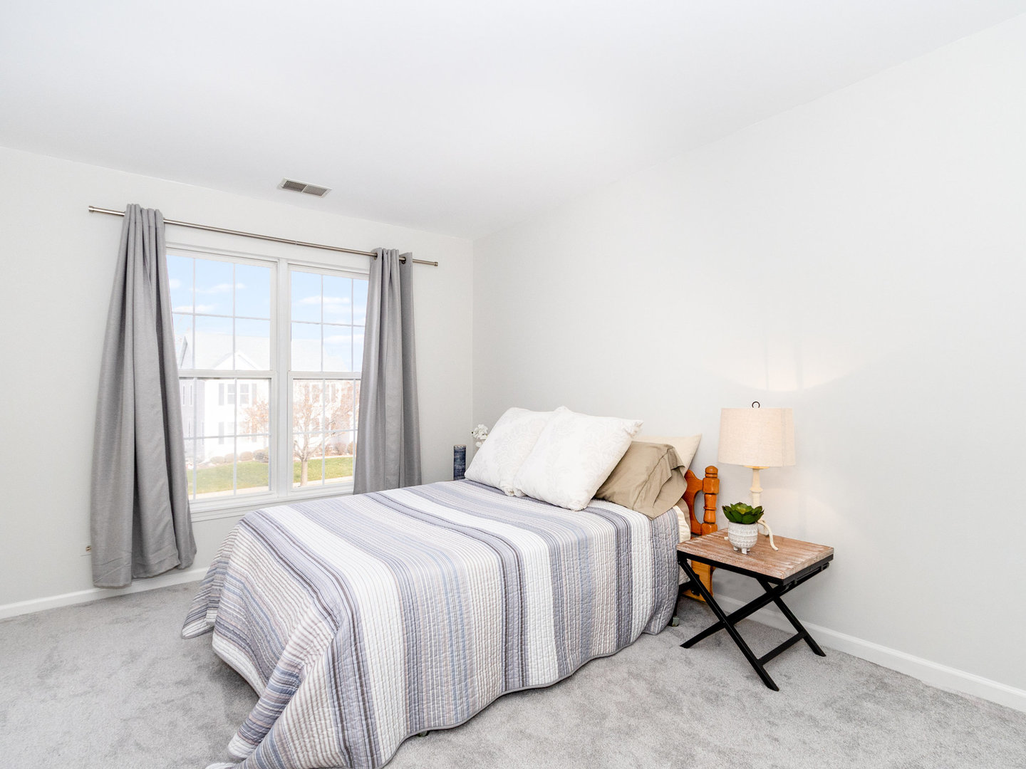 1195 Amaranth Drive Naperville, IL 60564 - Photo 25 of 48 a bedroom with a bed a window and mirror