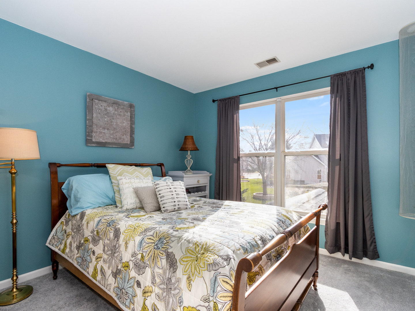 1195 Amaranth Drive Naperville, IL 60564 - Photo 26 of 48 a bedroom with a large bed and a lamp on table