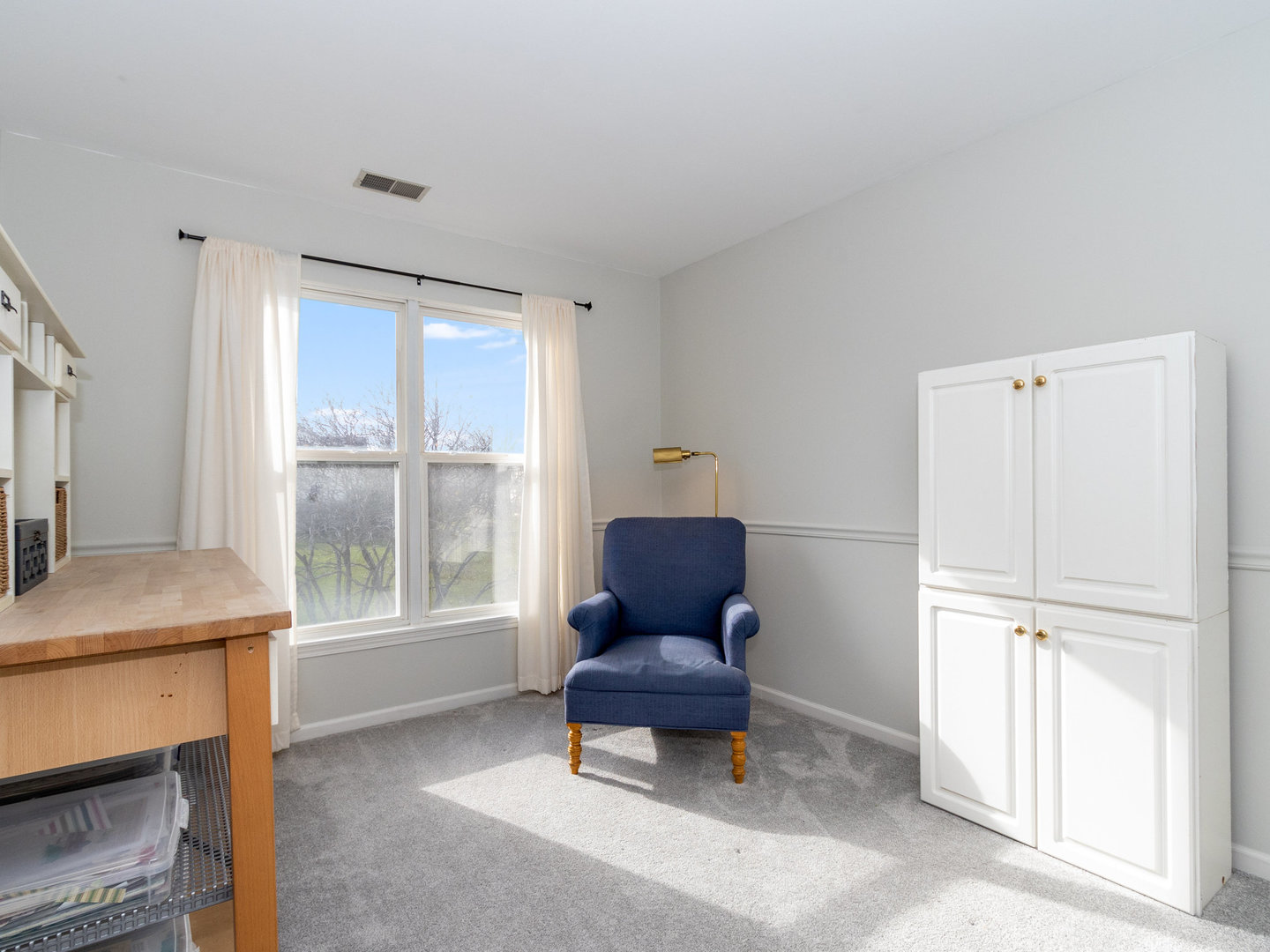 1195 Amaranth Drive Naperville, IL 60564 - Photo 27 of 48 a living room with furniture and a window