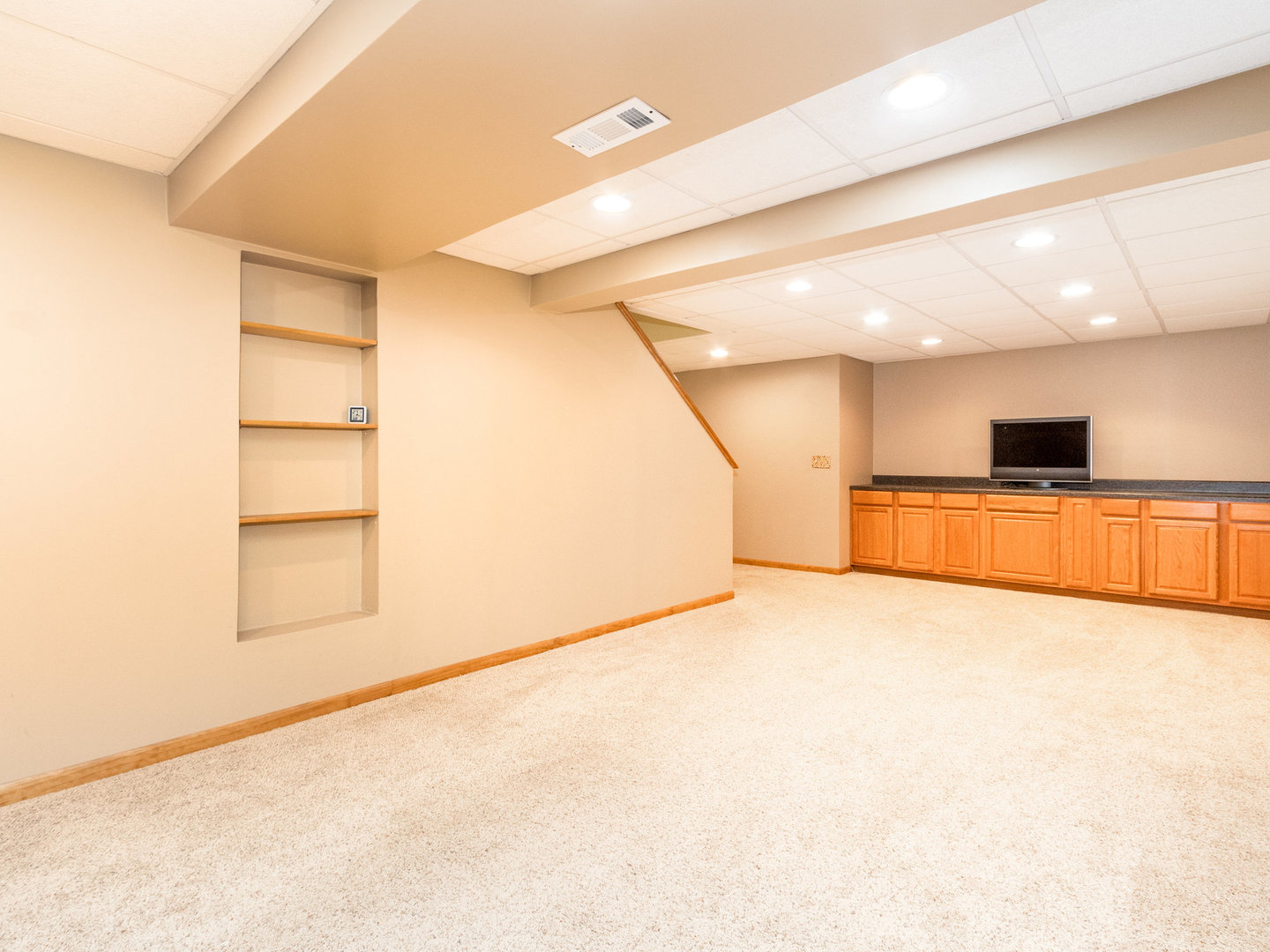 1195 Amaranth Drive Naperville, IL 60564 - Photo 30 of 48 a view of an empty room with a kitchen