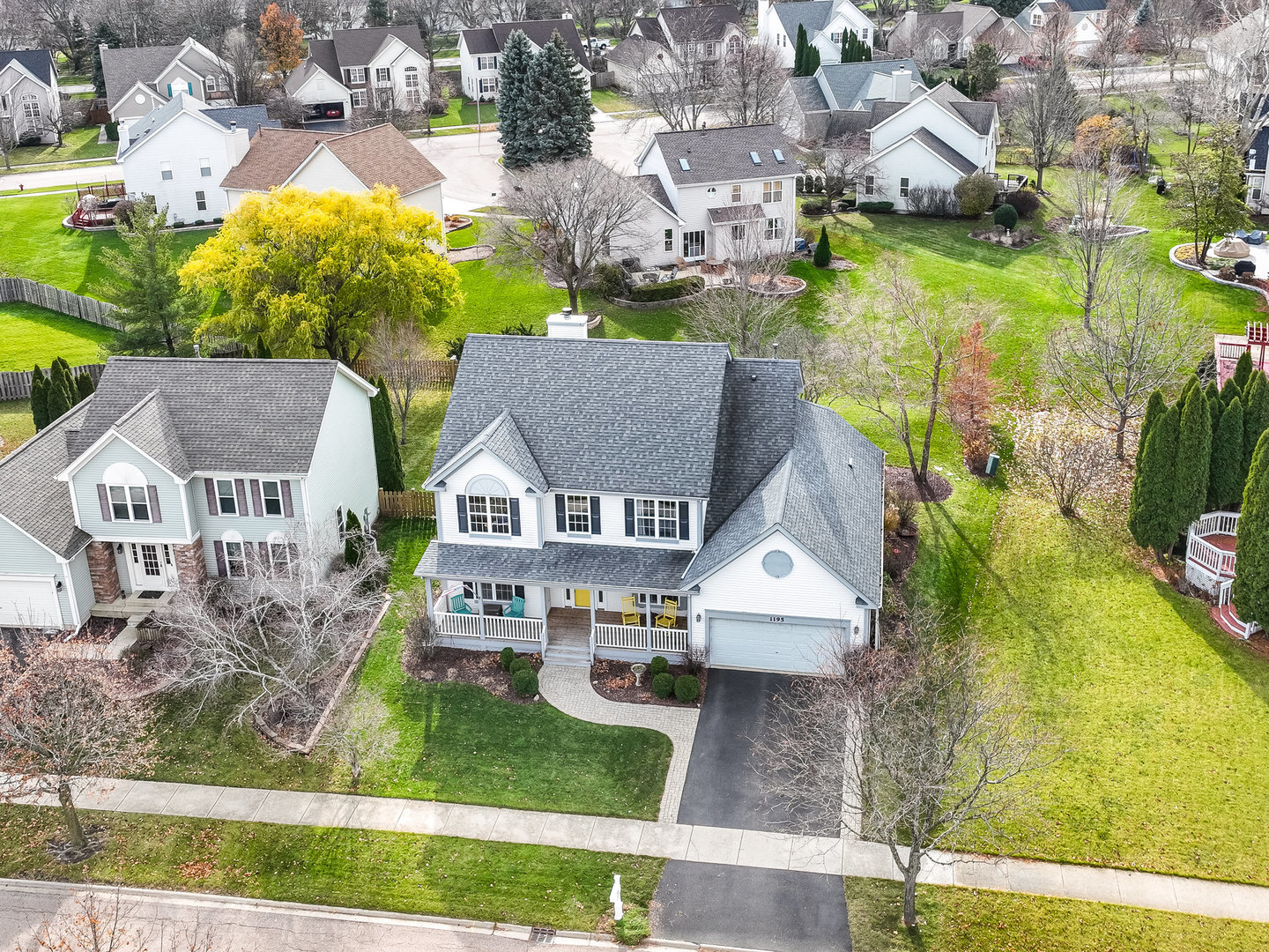 1195 Amaranth Drive Naperville, IL 60564 - Photo 38 of 48 an aerial view of residential houses with outdoor space and parking