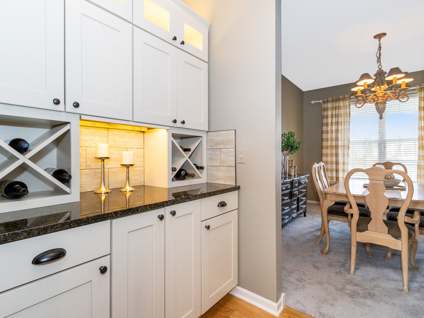 1195 Amaranth Drive Naperville, IL 60564 - Photo 9 of 48 a kitchen with stainless steel appliances granite countertop a sink and a white cabinets