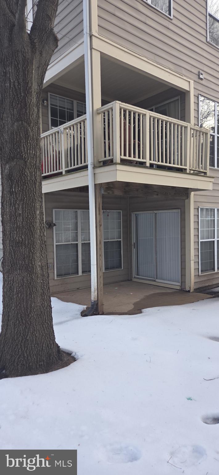 11192 Rienzi Place, Unit 102 Manassas, VA 20109 - Photo 19 of 19 a front view of a house with a yard
