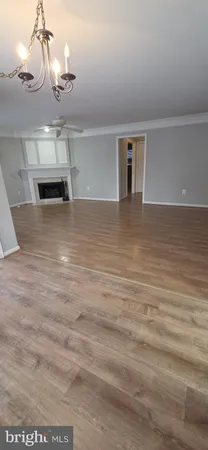 a view of a room with a dishwasher and dresser