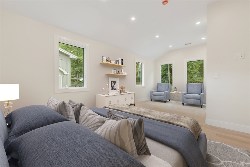 72 Wallis Road Brookline, MA 02467 - Photo 28 of 42 a large bedroom with two beds and a large window