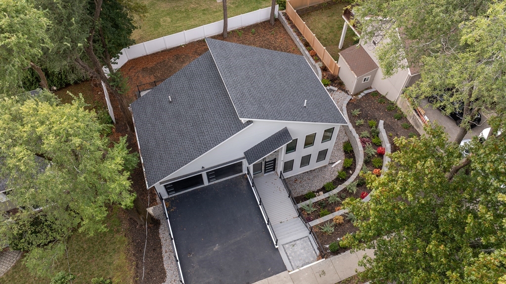 72 Wallis Road Brookline, MA 02467 - Photo 3 of 42 a aerial view of a house with a yard