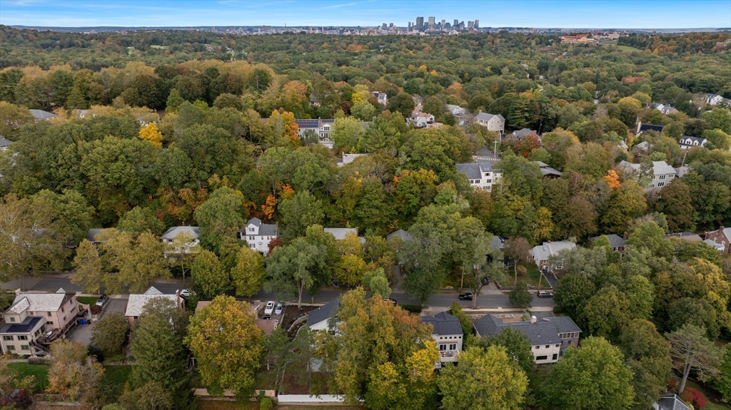 72 Wallis Road Brookline, MA 02467 - Photo 4 of 42 an aerial view of town with trees