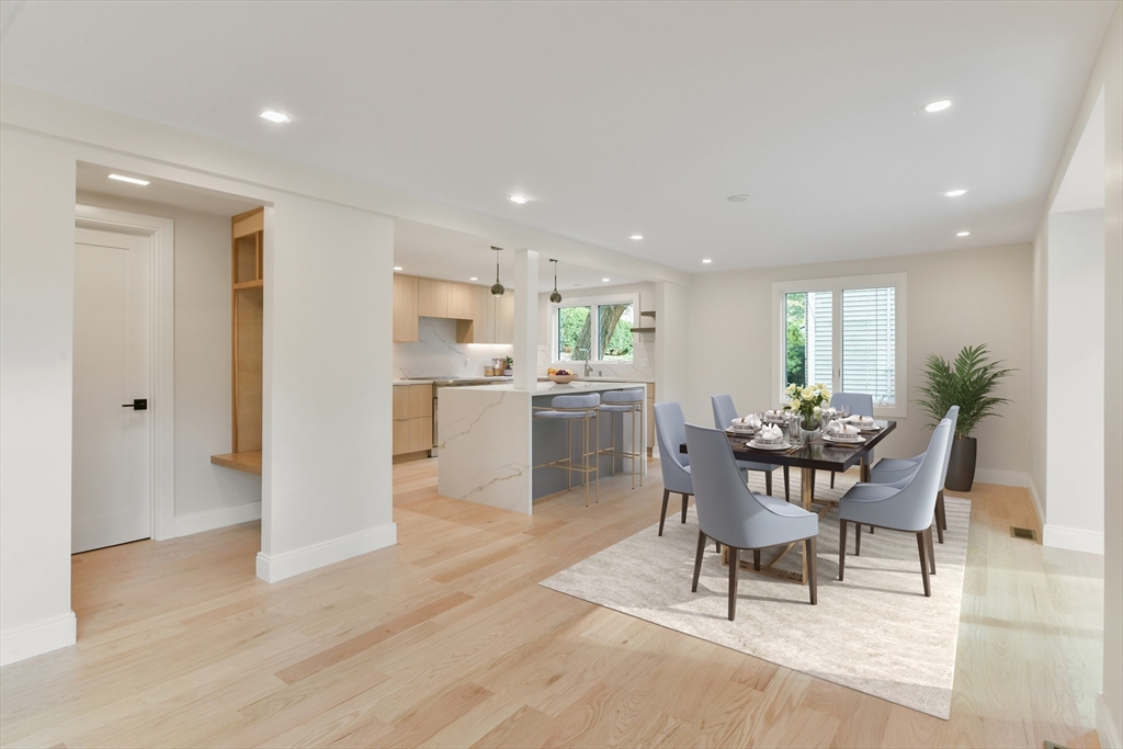 72 Wallis Road Brookline, MA 02467 - Photo 10 of 42 a view of a dining room with furniture and wooden floor