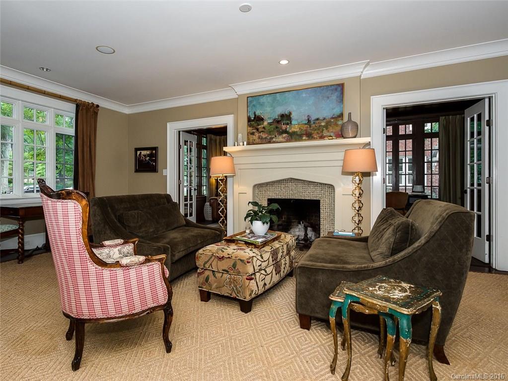 728 Berkeley Avenue Charlotte, NC 28203 - Photo 4 of 24 a living room with furniture and a fireplace