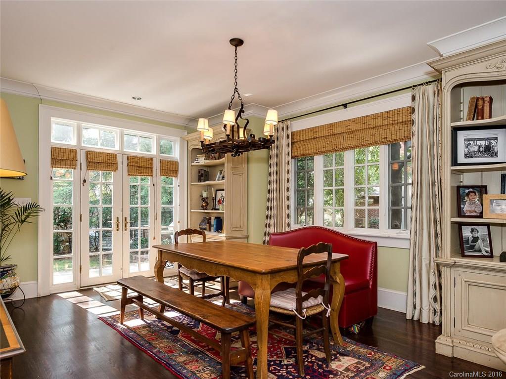 728 Berkeley Avenue Charlotte, NC 28203 - Photo 9 of 24 a view of a dining room with furniture window and wooden floor
