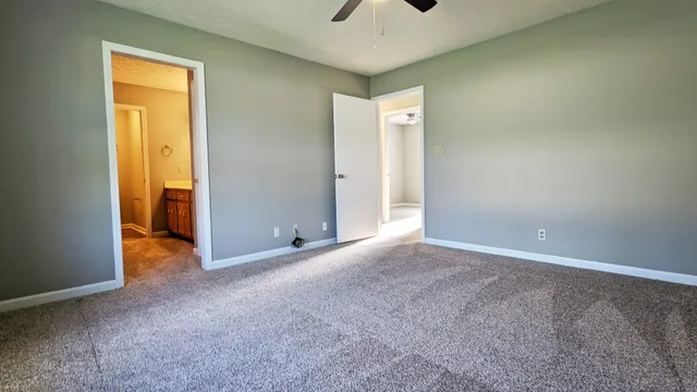 a view of an empty room and window