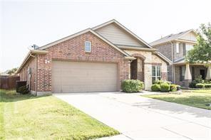 1409 Rosson Road Little Elm, TX 75068 - Photo 2 of 34 Brick exterior with stone accents, an attached two-car garage, concrete driveway, and front landscaping
