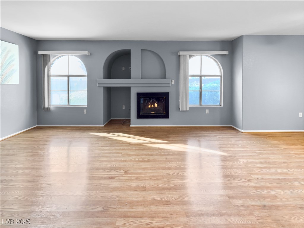 7950 West Flamingo Road, Unit 1169 Las Vegas, NV 89147 - Photo 8 of 42 Living room with fireplace