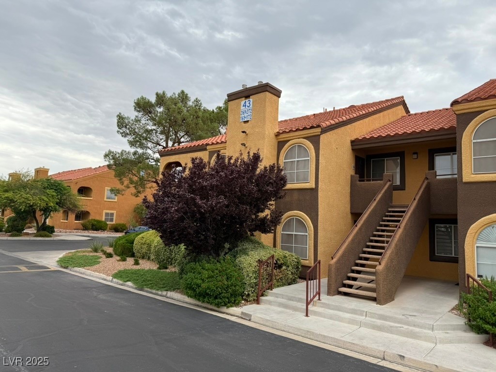 7950 West Flamingo Road, Unit 1169 Las Vegas, NV 89147 - Photo 23 of 42 Downstairs, corner lot with assigned cover parking & plenty of guest parking