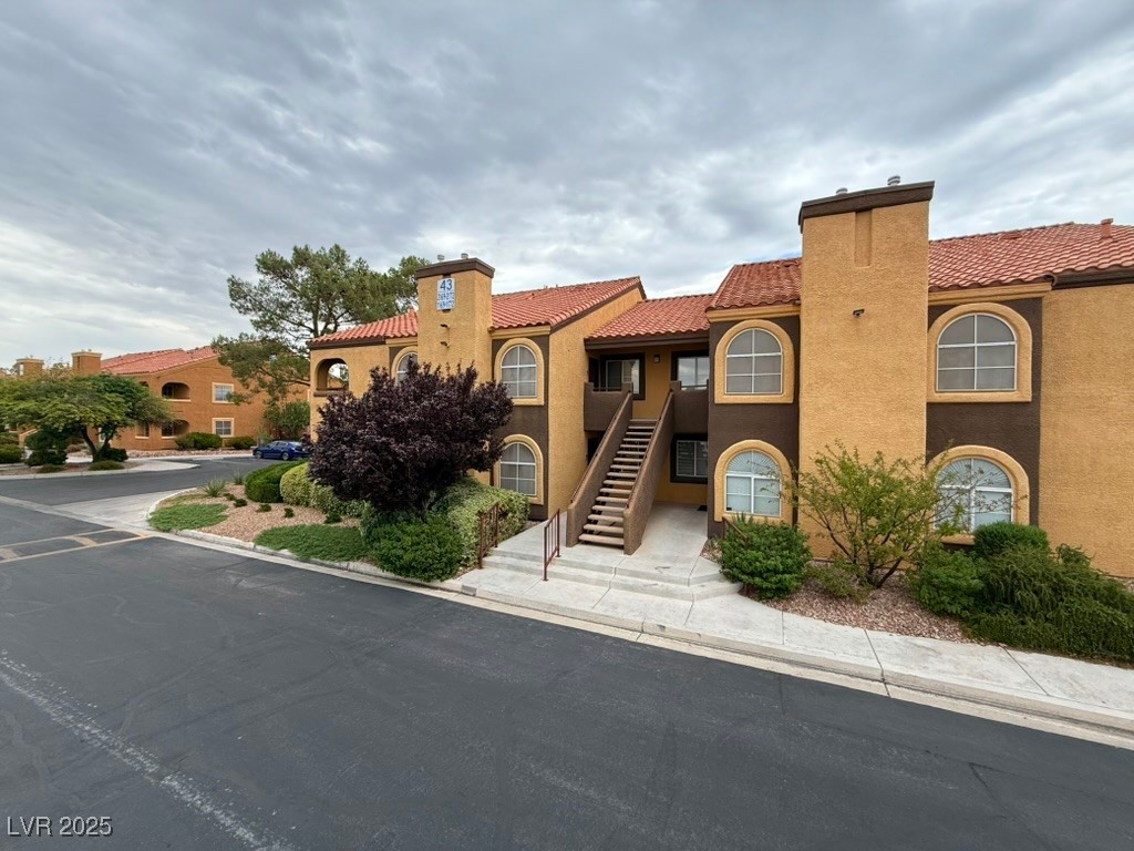 7950 West Flamingo Road, Unit 1169 Las Vegas, NV 89147 - Photo 24 of 42 Downstairs, corner lot with assigned cover parking & plenty of guest parking