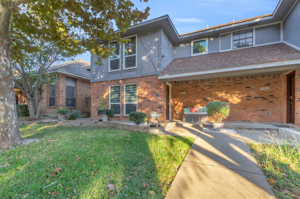 7670 Kings Ridge Road Frisco, TX 75035 - Photo 2 of 24 View of front of property featuring brick siding, a front lawn, roof with shingles, and stucco siding